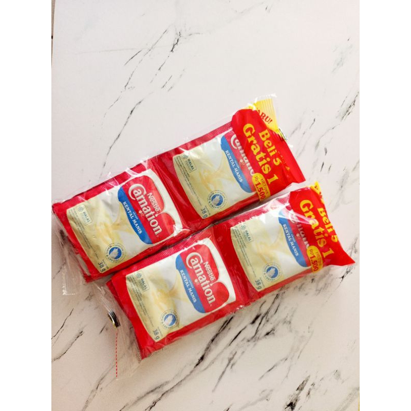 

Carnation Sachet 38gr isi 5 gratis 1