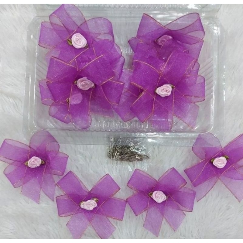 

Bunga Pita Panitia Hiasan Dress 8cm 1 KAP isi 12 pcs Sudah dapat Peniti Terpisah