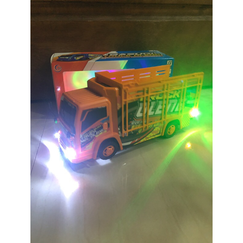 Mainan TRUK OLENG bisa jalan oleng ada lampu dan musik