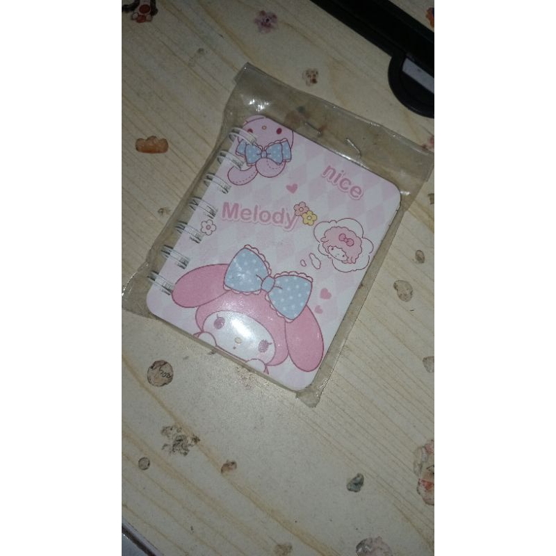 

Notebook & notepad melody berwarna pink