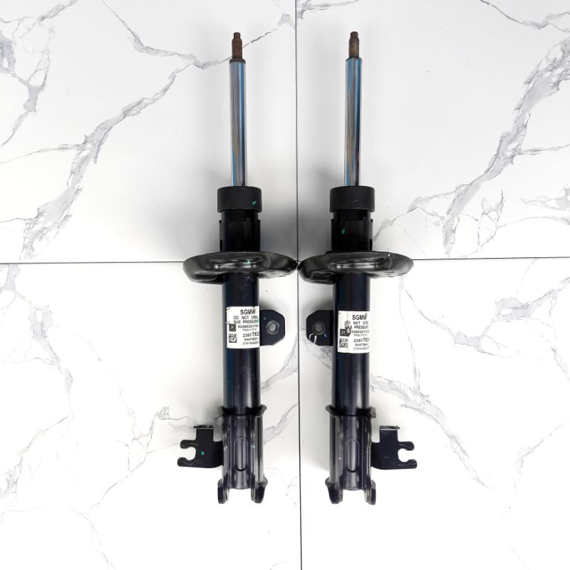 shock wuling almaz depan