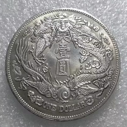 Koin kuno one dollar naga Cina