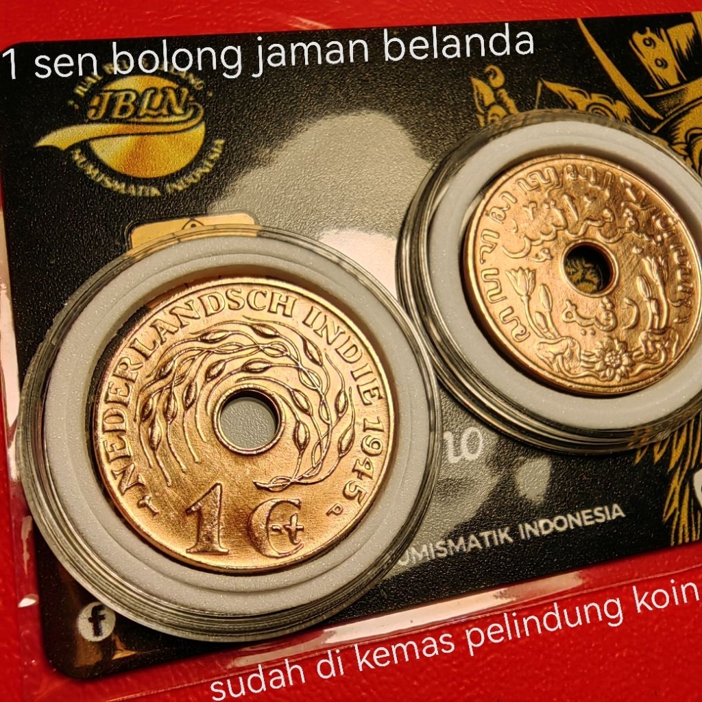 1 sen bolong tahun campur di jamin asli dan bagus utuh sudah di kemas pelindung koin benggol belanda