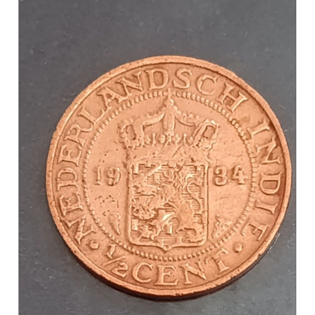 koin Nederland indie 1/2 cent tahun 1934..
