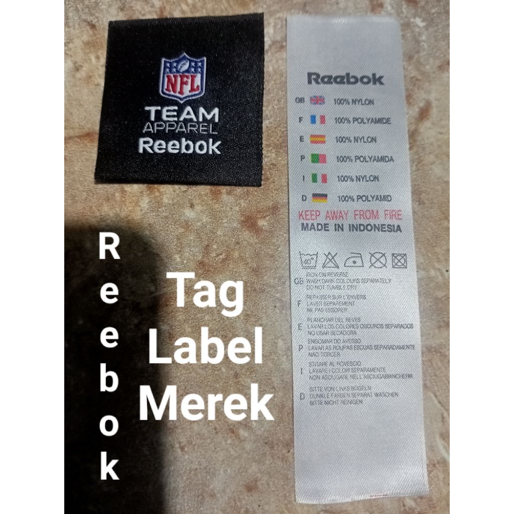 

label merek brand label (main misc) label tag NFL reebok (paket isi sepasang)