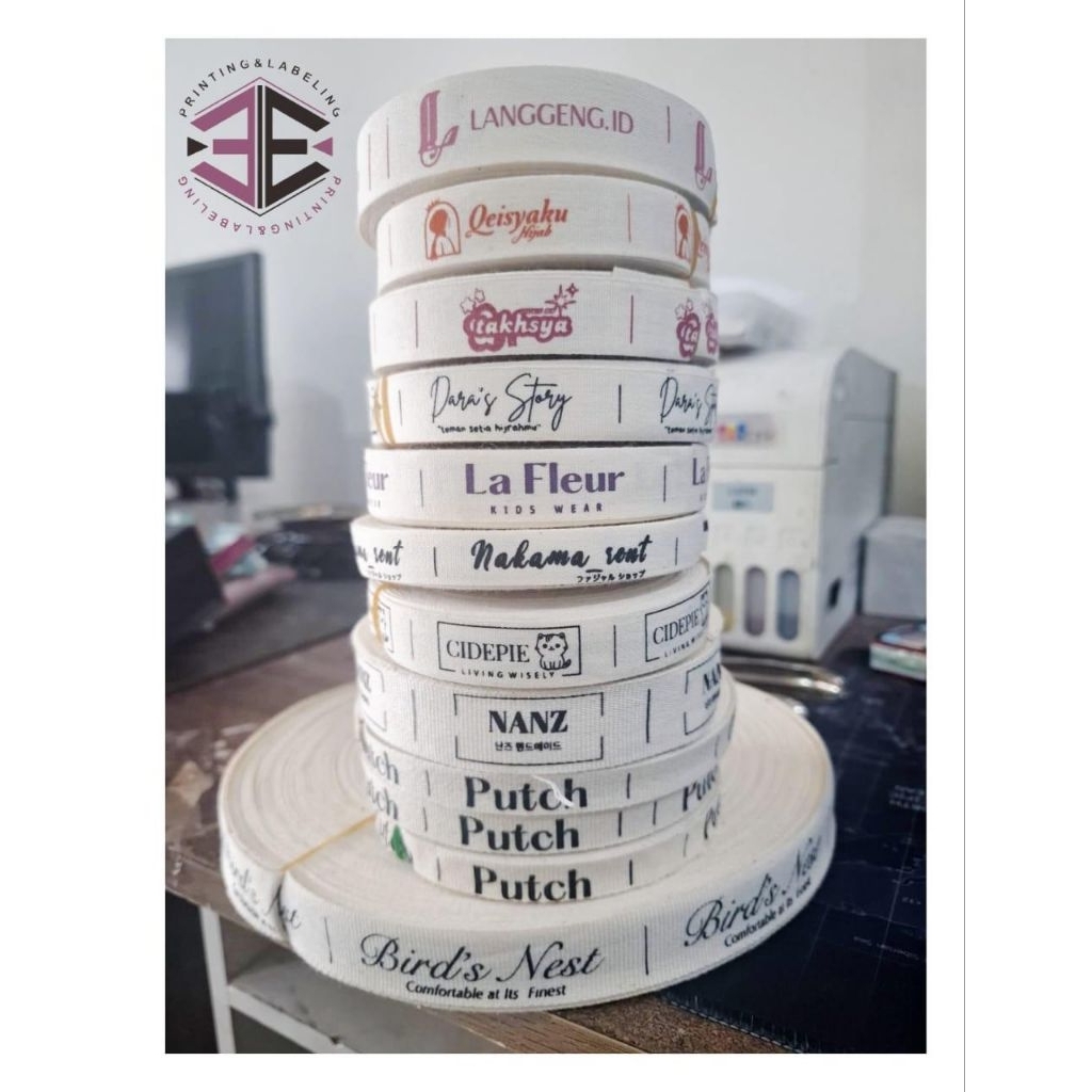 (LABEL PITERBAN IMFORT PANJANG 20 METER)label baju label sablon piterban imfort bahan halus free des