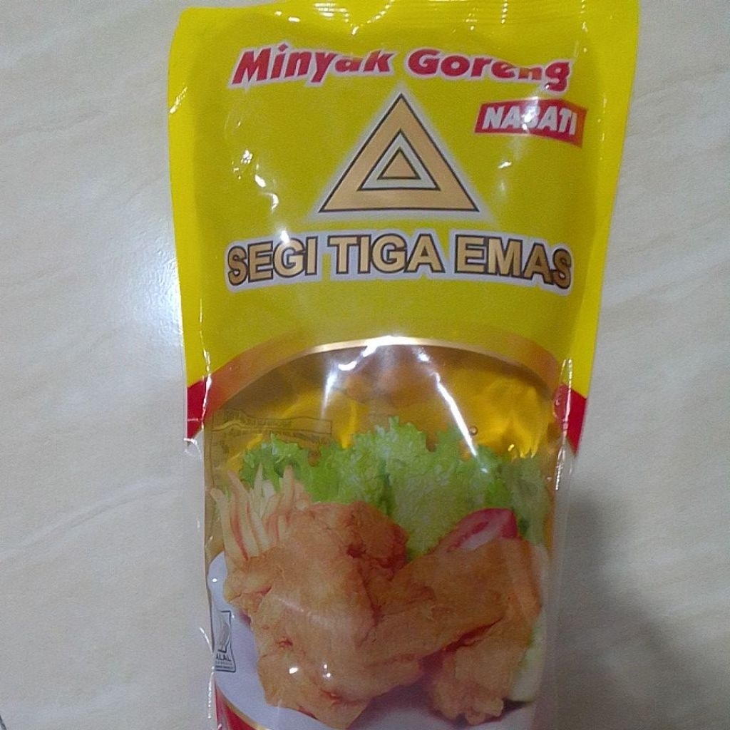

minyak goreng segitiga mas 1L