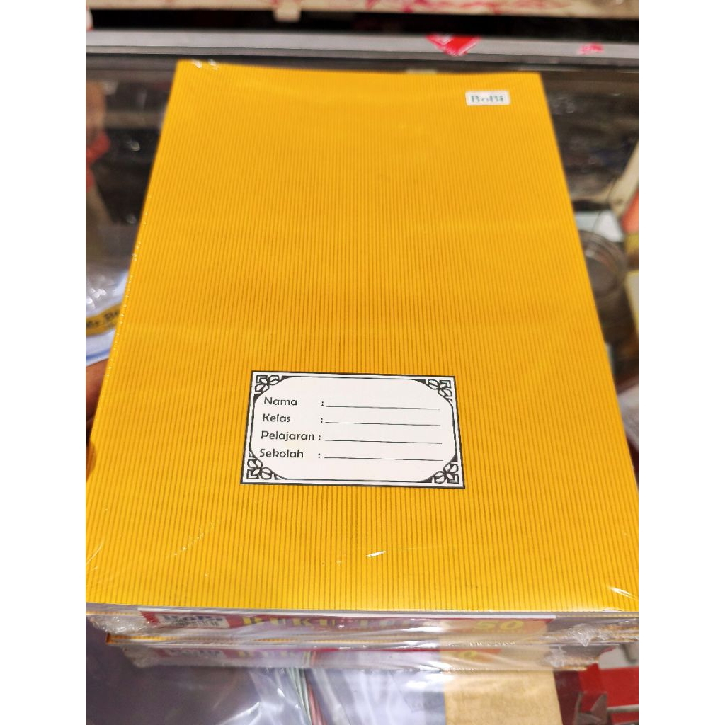 

Buku tulis Panjang cover kraft BOBI 50 lembar isi 10 buku