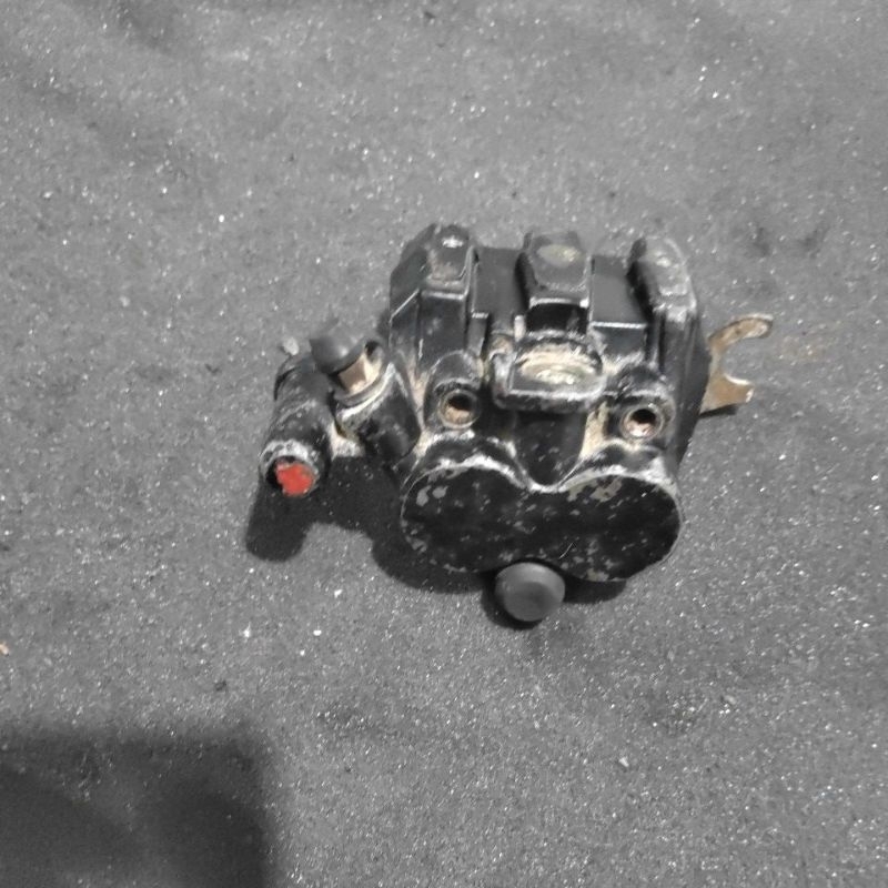 kaliper rem depan supra x 100 supra x 125 karisma 125 original