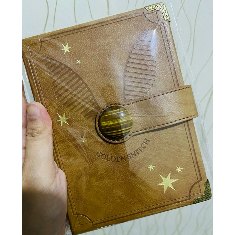 

Buku golden snitch Miniso x Harry potter