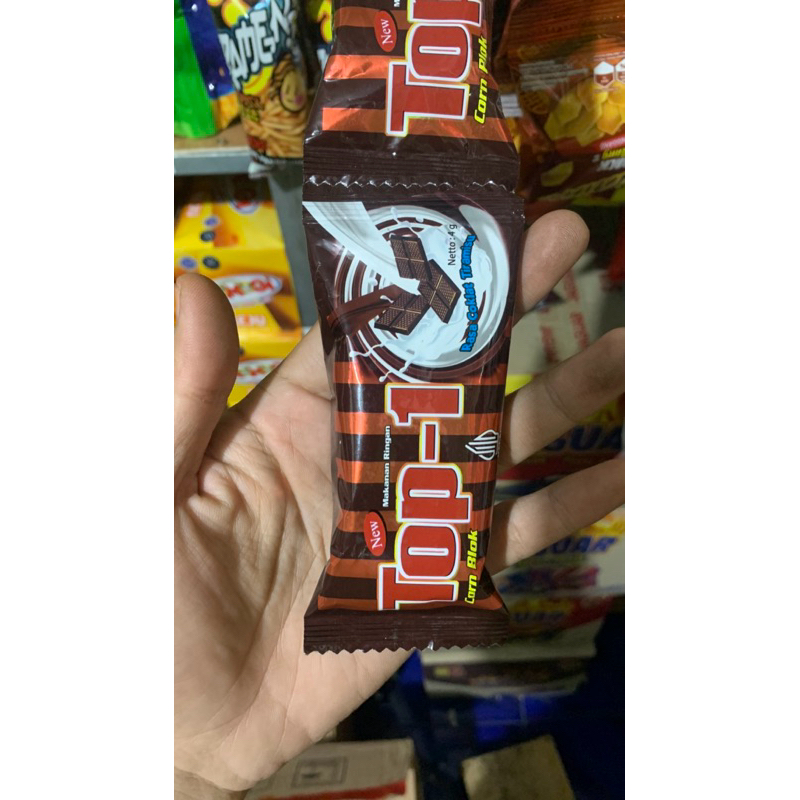 

CHIKI COKELAT TOP 1 500 san 1 Renceng isi 10 pcs