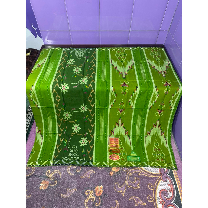 Sarung DONGGALA MGT S100 sutra 50%.