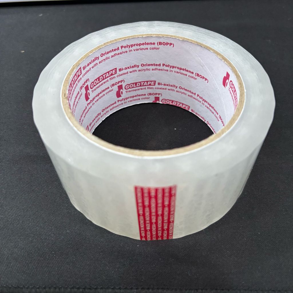

Lakban OPP Bening Goldtape ( Garansi Aman ) / Lakban Bening Murah Free packing dus / Isolasi Besar