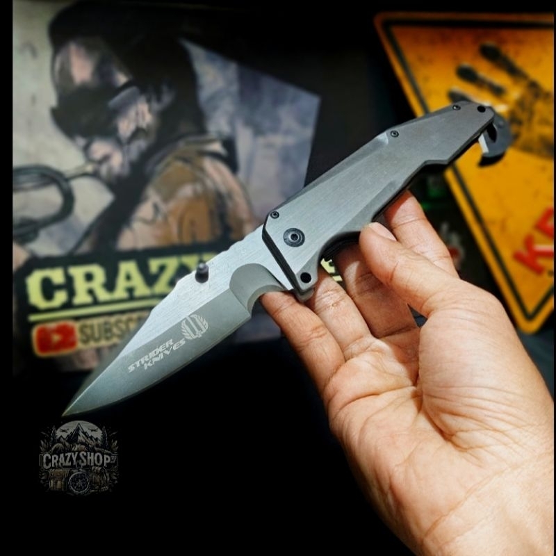Pisau Survival Lipat Strider knife Surfase Titanium / Pisau Saku Lipat /Pisau Survival multifungsi