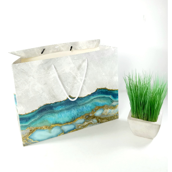 

Paperbag Marble Ocean Blue Uk (Landscape 32,5 x 14 x 25 cm dan Potrait 24 x 14 x 35 cm)