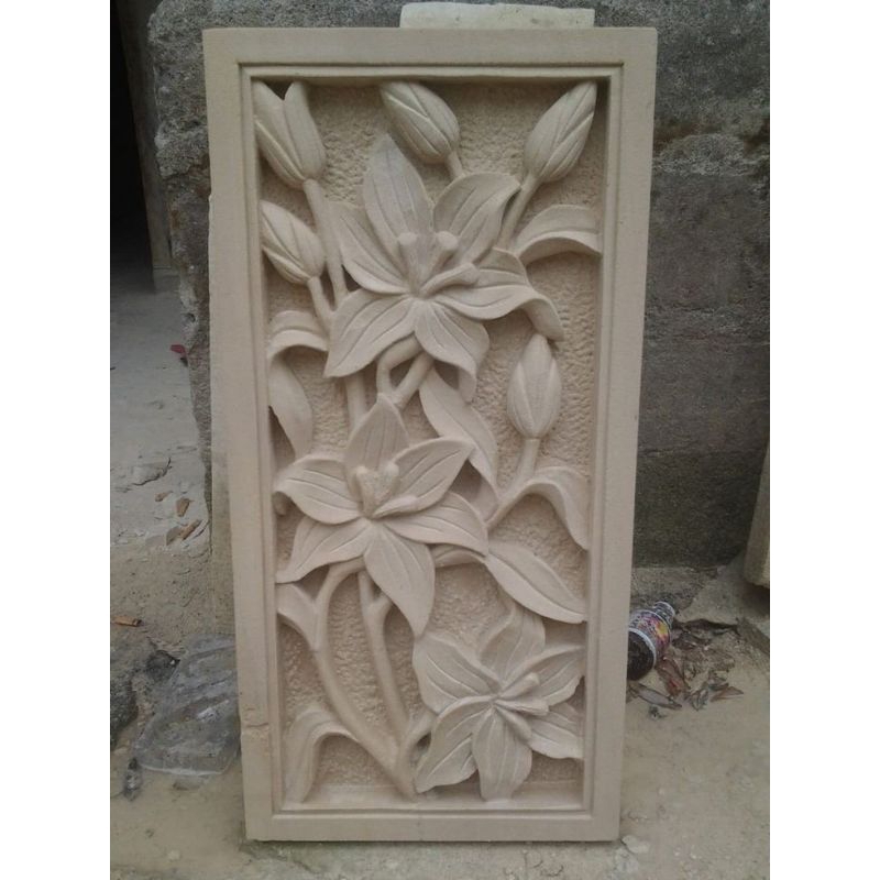 relief ukiran batu paras motif bunga bakung dan tumbuhan