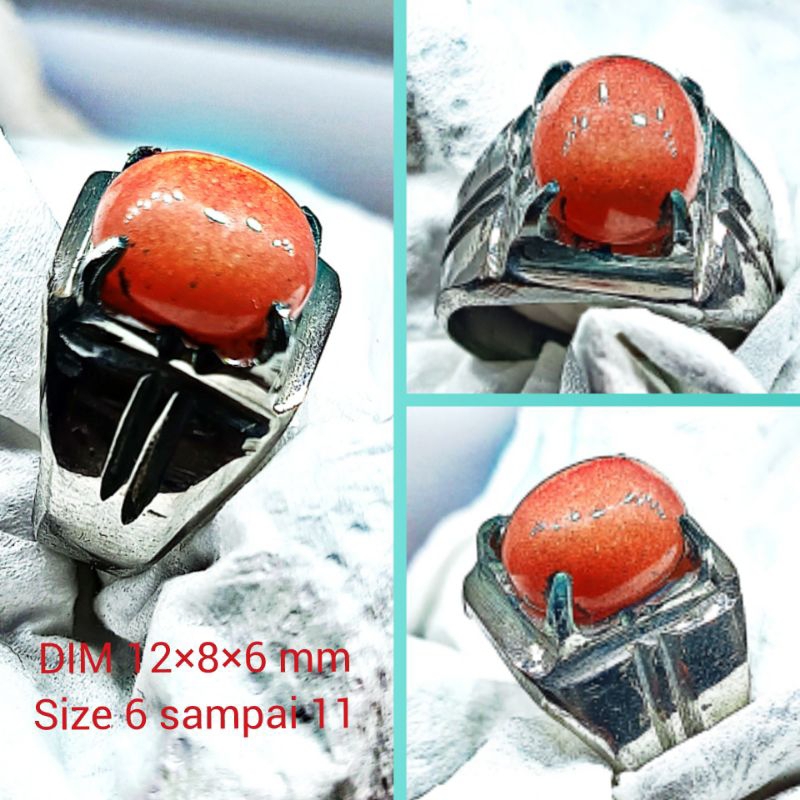 Cincin batu fosfor merah menyala ditempat gelap