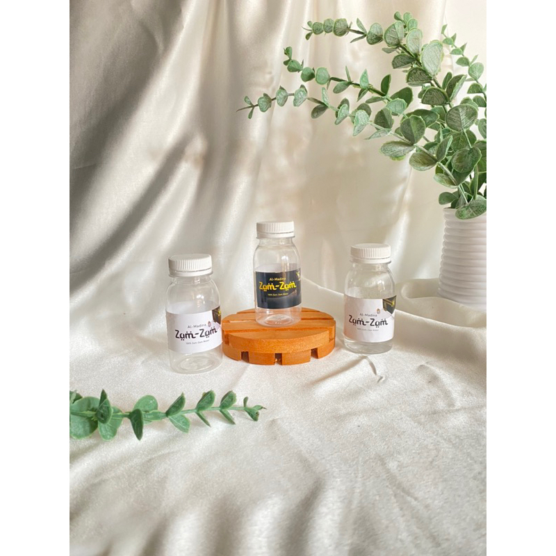 

Air zam zam isi 80 ML tersedia botol warna hitam putih desain cantik sepasang dengan ziplock Oleh Oleh Umroh Haji