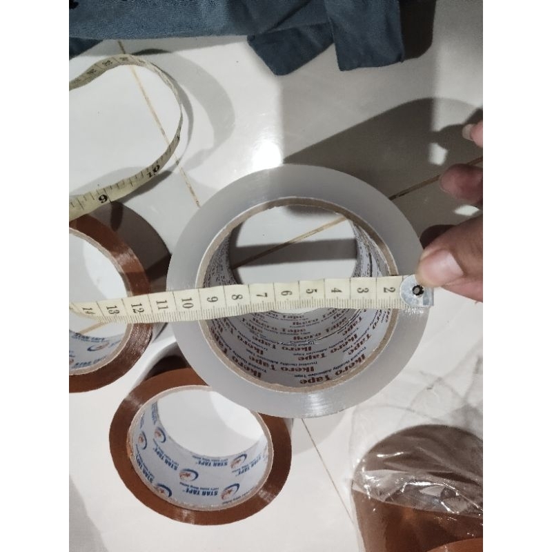 

Lakban Isolasi tape bening dan coklat ukuran isolasi tape 2"×100yard , pembelian perbiji