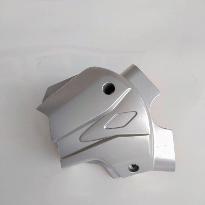 TUTUP GEAR DEPAN REVO AT MATIC ORIGINAL COPOTAN