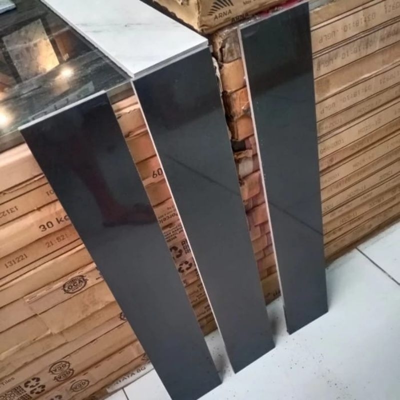 List plint granite 10x60 hitam polos glossy murah