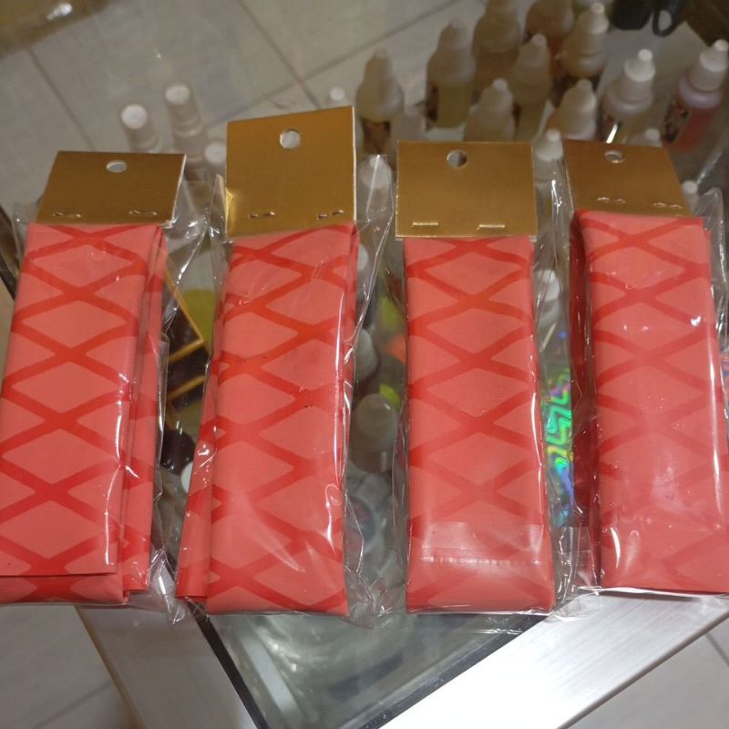 karet bakar/grip bakar warna merah motif silang 50cm