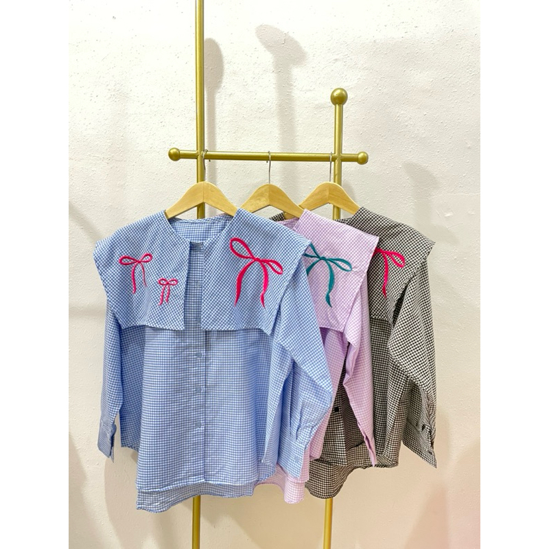 

ATASAN WANITA KOTAK KOTAK SABLON PITA