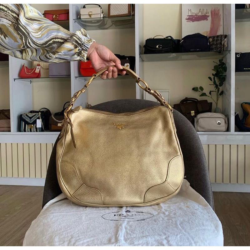 prada hobo gold leather