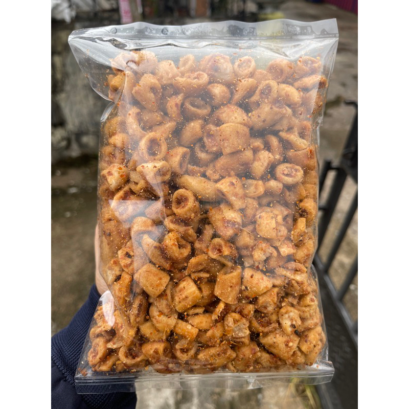 

SOTONG PEDAS DAUN JERUK 1 KG CEMILAN CAMILAN PEDAS GURIH ENAK TERLARIS