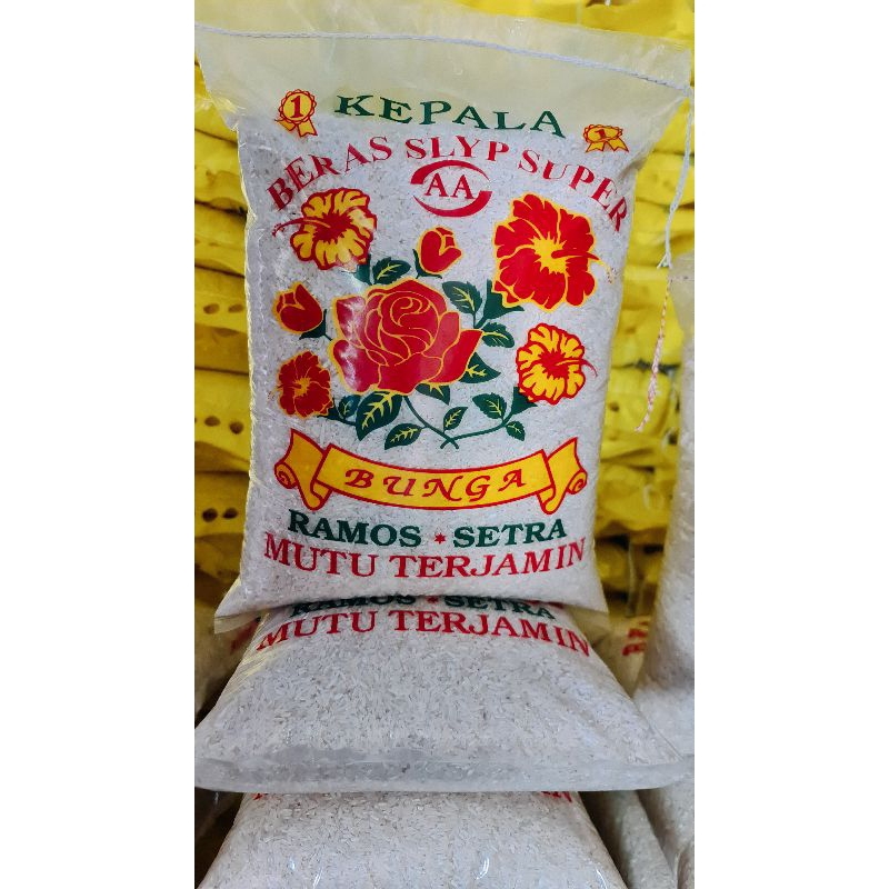 

beras enak pulen nasinya cap bunga ramos setra