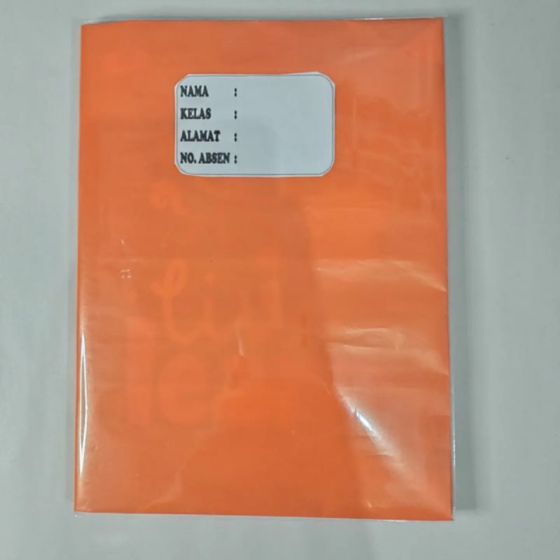 

buku tulis sudah disampul sukung warna oren dan sampul plastik
