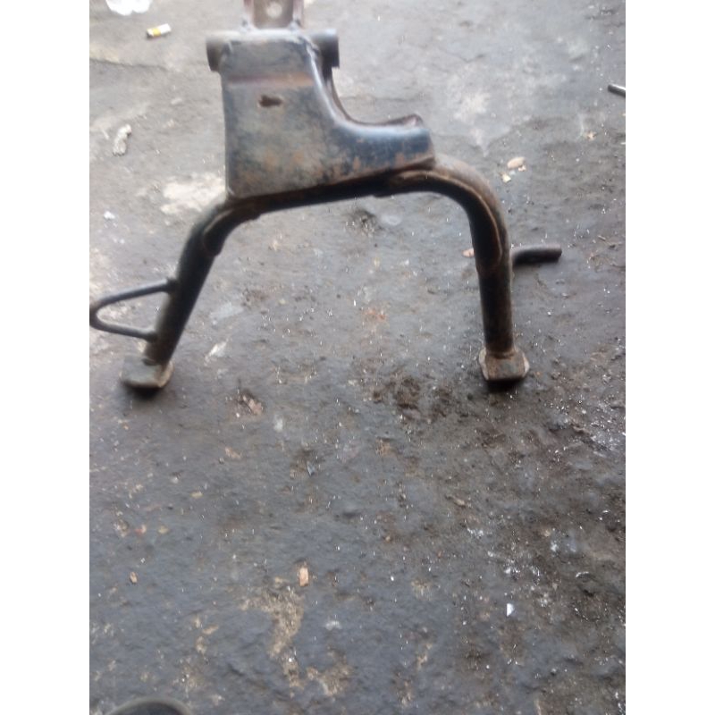 standar tengah Revo AT, metik original copotan