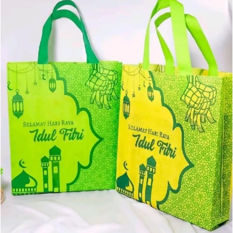 

1 LUSIN ( 12 PCS ) TAS SPUNBOND LEBARAN UKURAN 30X40X10 4 SISI