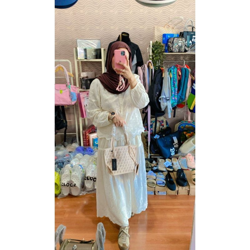 tas christy ng