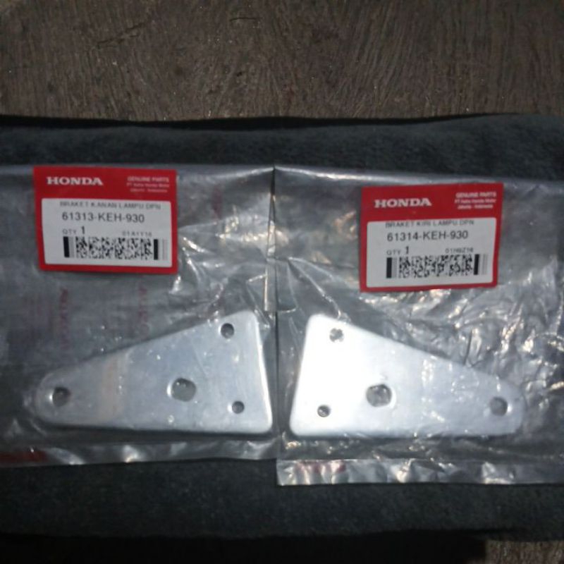 Kupingan lampu depan honda tiger lawas megapro hiu original baru AHM