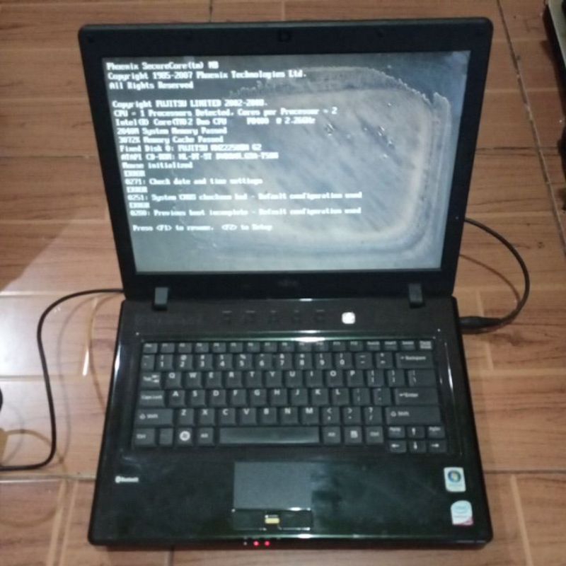 Laptop Fujitsu L1010 Intel core 2duo DDR3 kondisi LCD rusak & tidak ada Charger