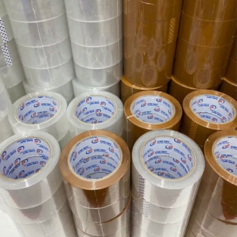 

Lakban bening / coklat star tape untuk packing 45mm x 90 yard 6 pcs ( 1 slop )