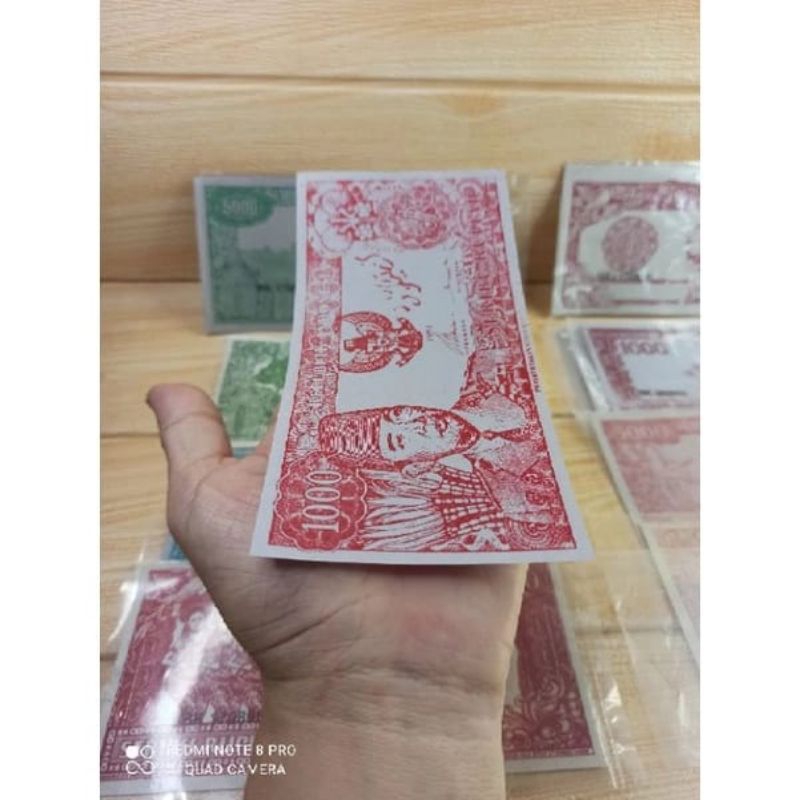 mainan sulap uang melengkung