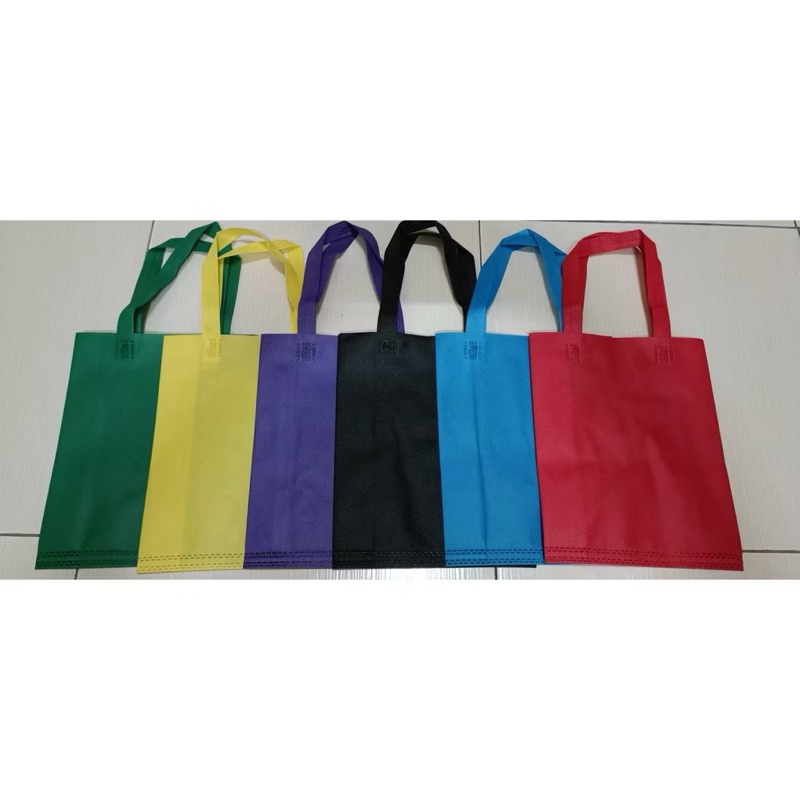 

Tas Spundbond goodie bag tebal polos murah lipat samping