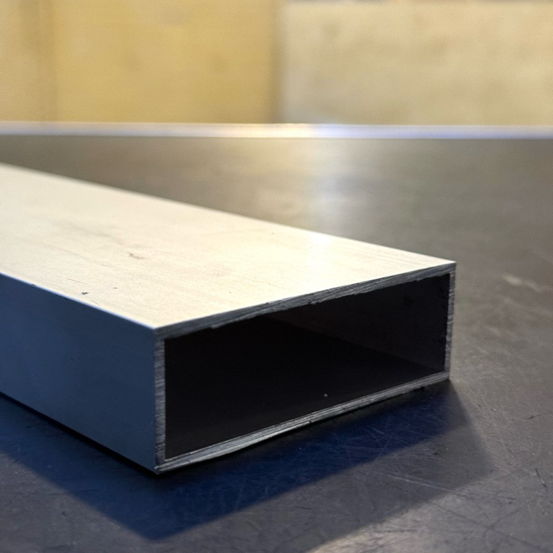 Holo Alumunium / Aluminium 6063 Ukuran 25 .4 mm x 76 .2 mm x Tebal 2 mm harga panjang per 10 CM