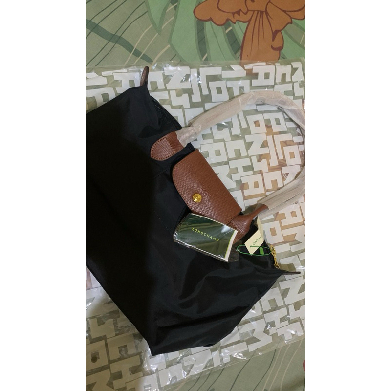 Tas longchamp hitam