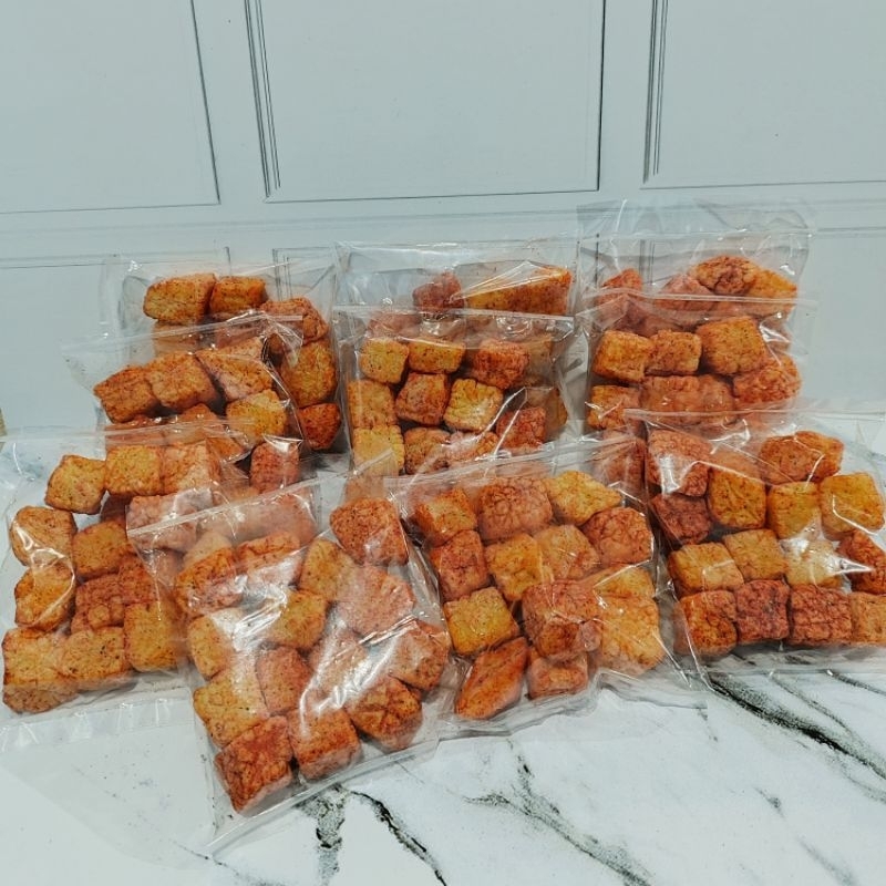 

Snack Kerupuk Tahu Pedas Kemasan 1 Pack isi 10
