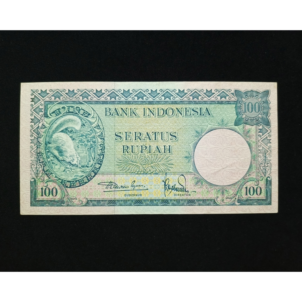 UANG KERTAS JADUL 100 RUPIAH SERI HEWAN TUPAI 1957