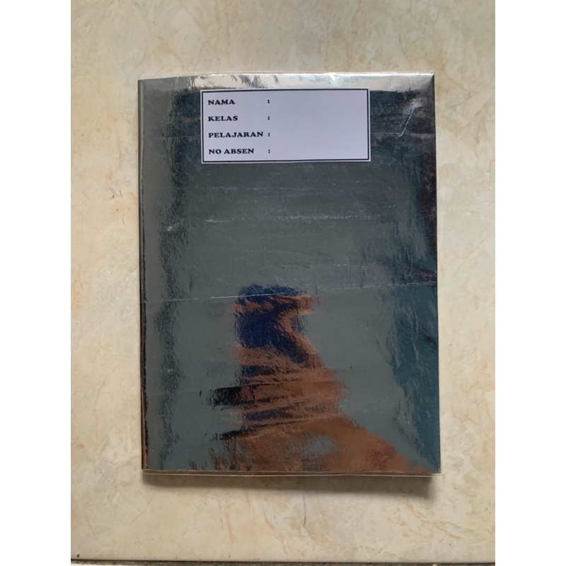 

buku tulis sudah disampul sukung warna silver dan sampul plastik