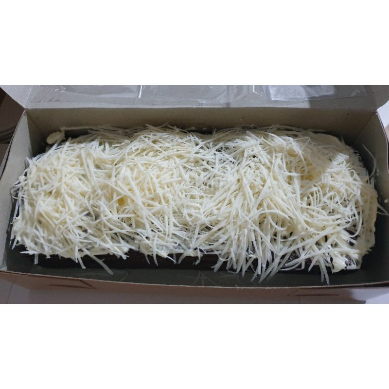 

(Khusus DKI jakarta jabodetabek) Brownies kukus bertoping keju, berlapis filing coklat ukuran 11x24 berat 500gr