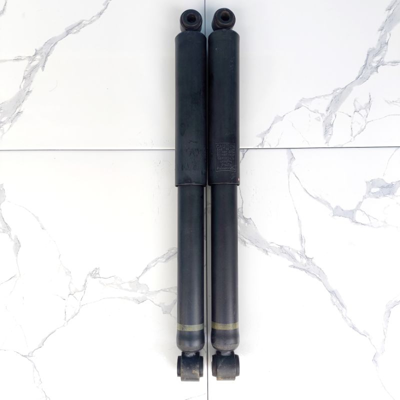 shock nissan navara d40 belakang