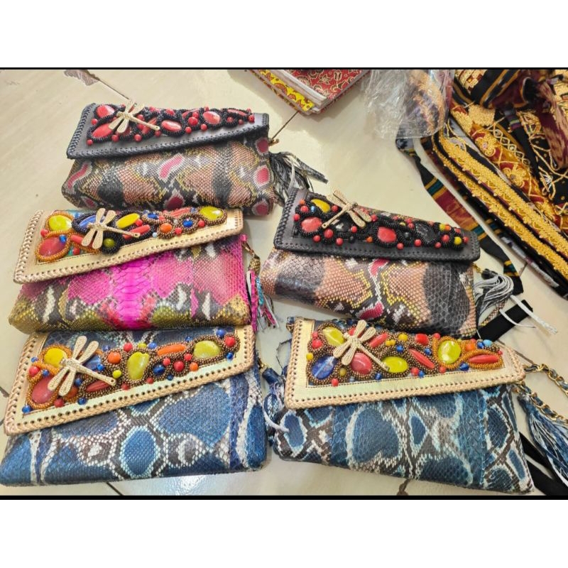 Tas pesta kulit ular ori