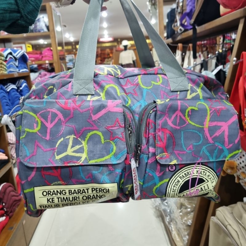 TAS LIPAT WANITA. TAS TRAVEL JOGER ORIGINAL. OLEH OLEH BALI