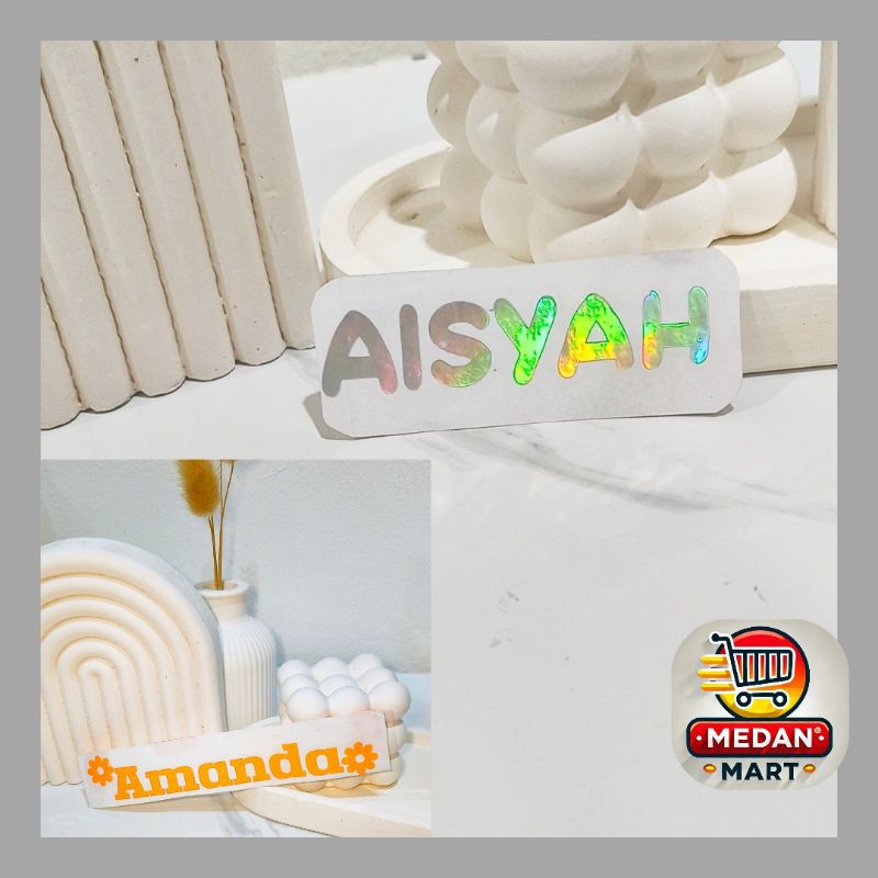 

STIKER NAMA CUSTOM HOLOGRAM DAN WARNA GLOSSY ANTI AIR WATERPROOF (1 WARNA)