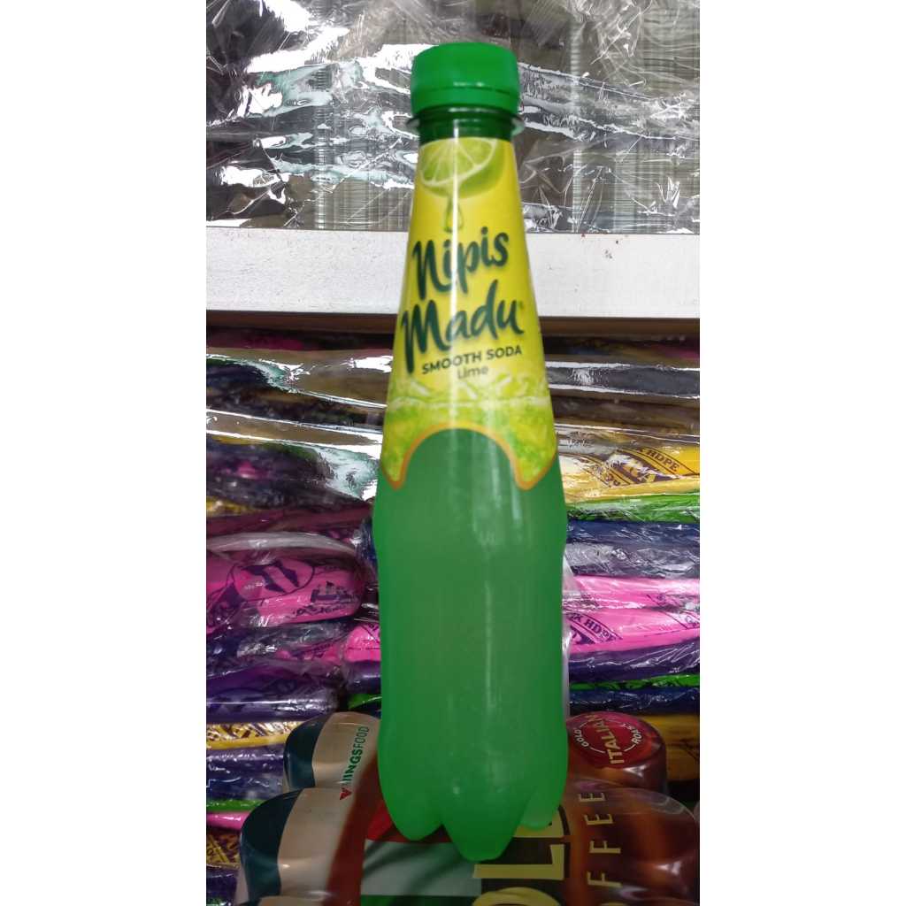 

Nipis madu kemasan botol 330 ml minuman bersoda per karton isi 12 botol